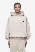 Pegador Leono Boxy Hoodie Washed Light Beige Virtual Pink Gum Hauptansicht aus der Most Alive Kollektion für Herren